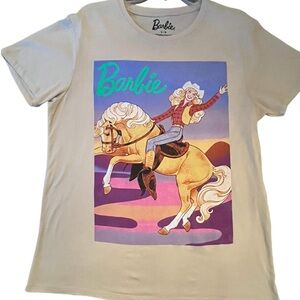 Women’s Barbie Short Sleeve Shirt in Light Tan Size Large.
